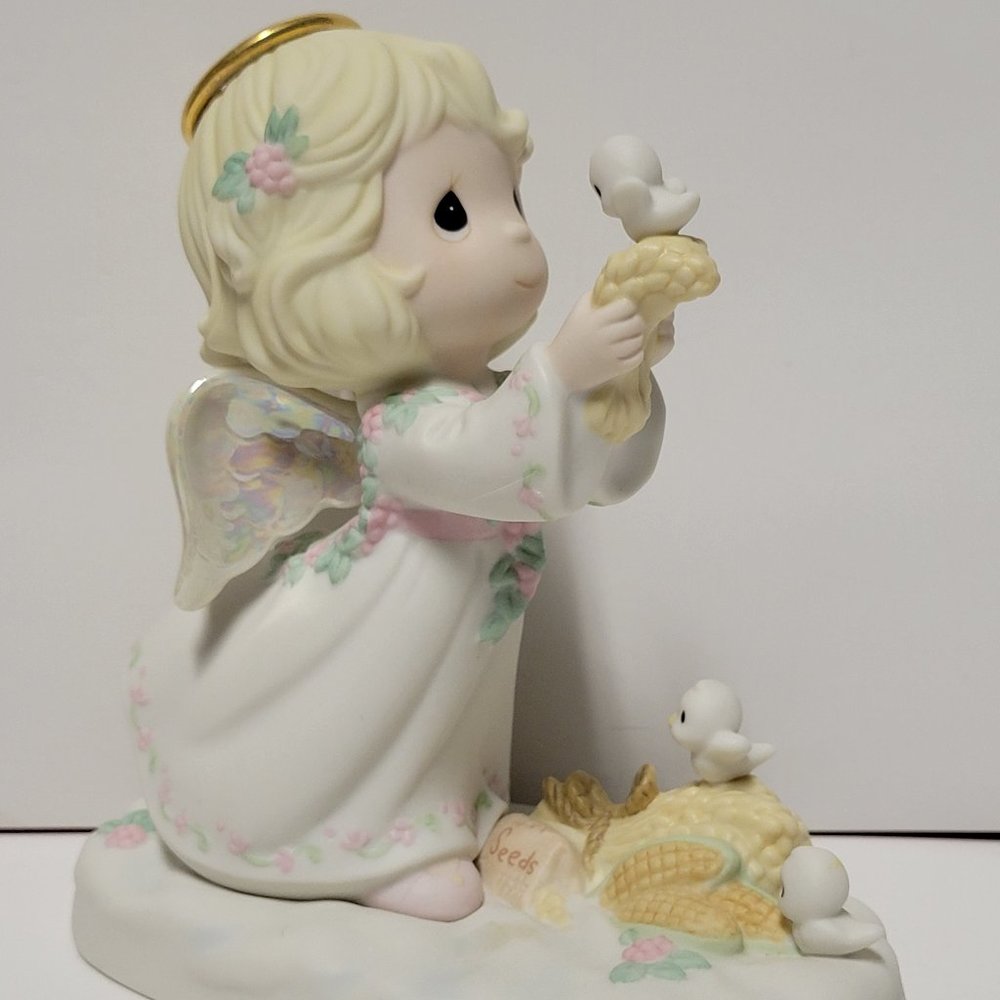 Precious Moments Figurine "Christmas Is Loving"